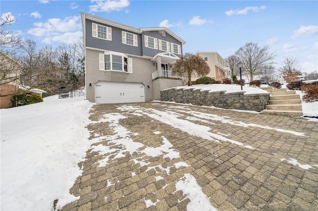 view of front of home with a garage