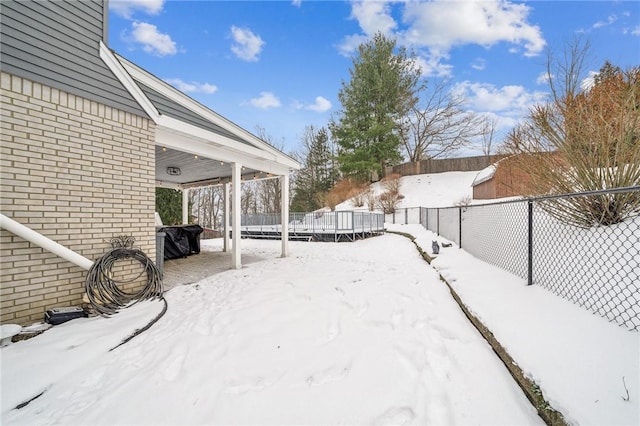 view of snowy yard