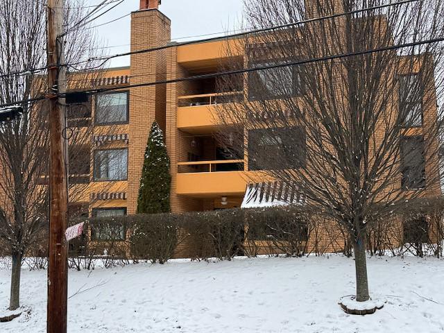 view of snow covered building