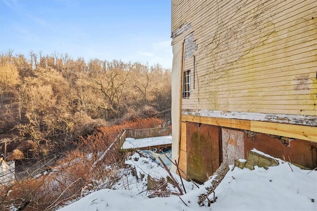 view of snow covered property