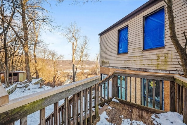 view of snow covered deck