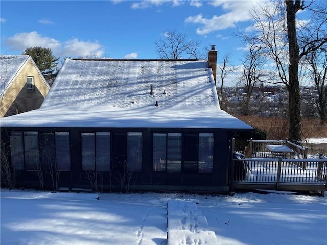 view of front of property with a wooden deck