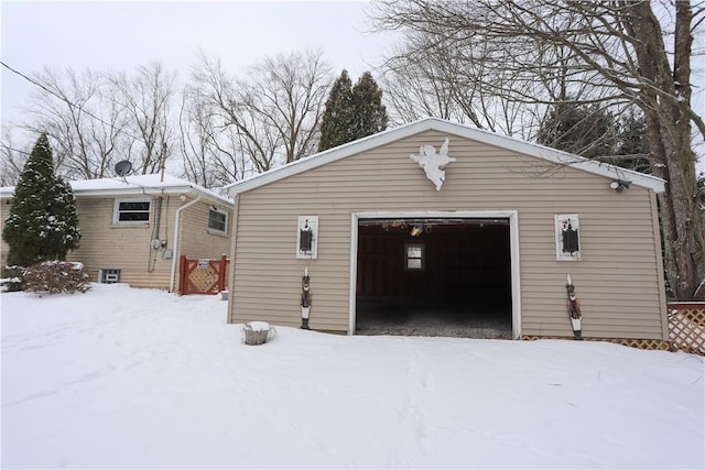 view of snow covered garage