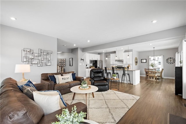 living room with dark hardwood / wood-style floors