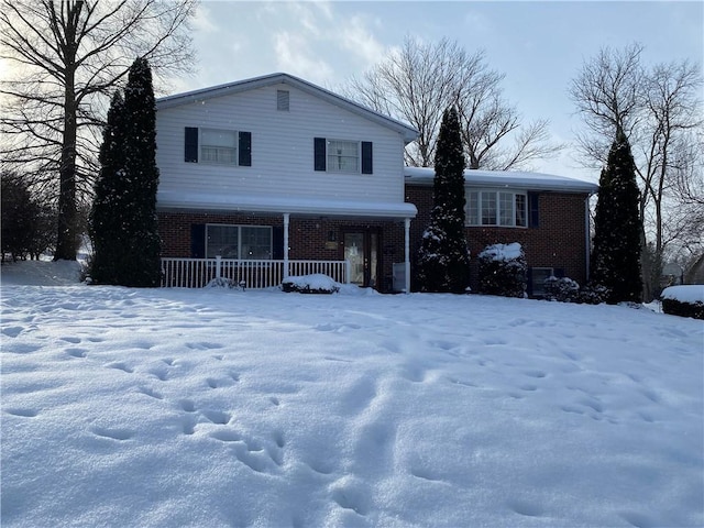 view of front of home featuring covered porch