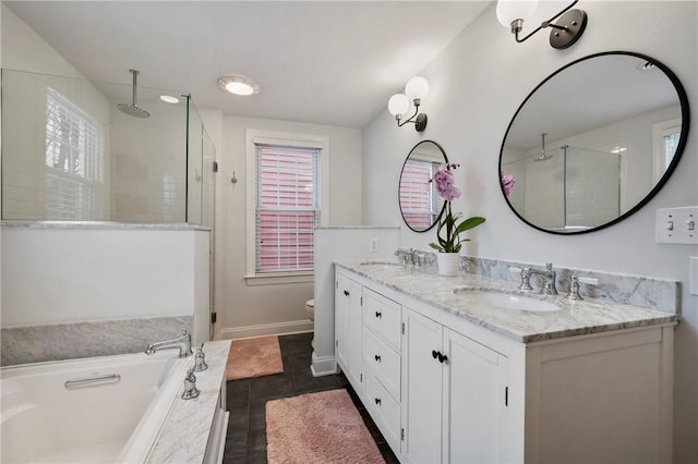 full bathroom with toilet, tile patterned floors, vanity, and separate shower and tub