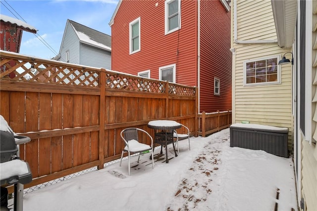 view of snow covered patio