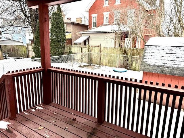 view of snow covered deck