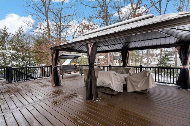 view of snow covered deck