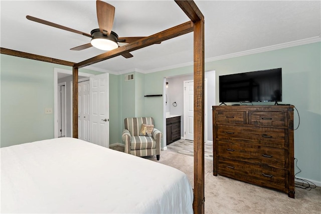 bedroom with connected bathroom, ceiling fan, crown molding, and light carpet