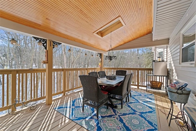 view of snow covered deck