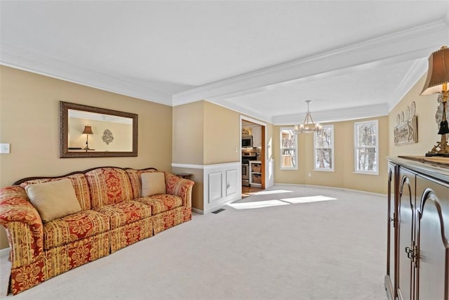 living room with light carpet, a chandelier, and crown molding