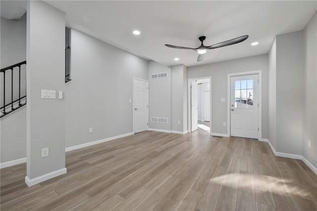 interior space featuring light hardwood / wood-style floors and ceiling fan