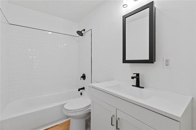 full bathroom with vanity, toilet, wood-type flooring, and shower / washtub combination