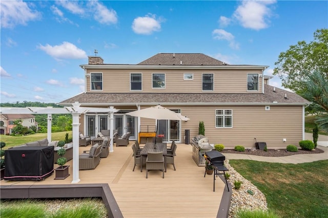 back of house featuring an outdoor living space and a deck