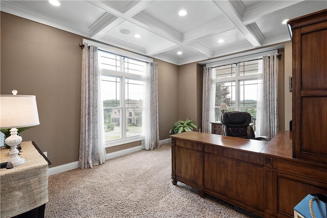 home office with beam ceiling, a healthy amount of sunlight, light colored carpet, and ornamental molding