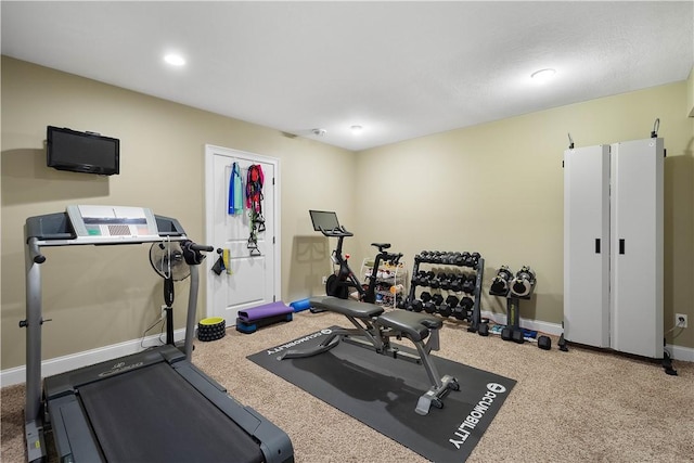 exercise area featuring carpet floors