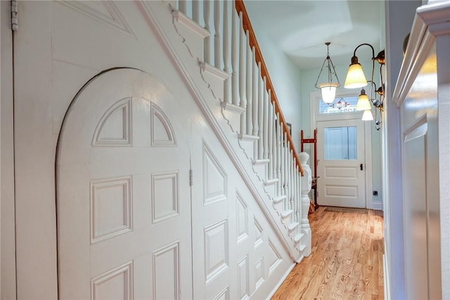 doorway with light hardwood / wood-style floors