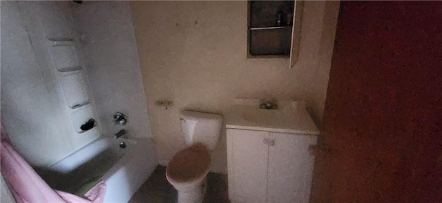 bathroom with tub / shower combination and toilet