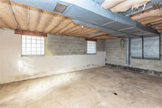 basement featuring plenty of natural light