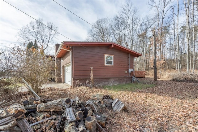 view of property exterior featuring a garage