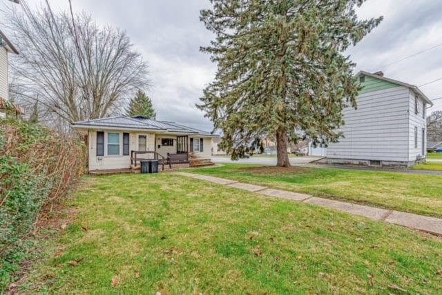 exterior space with a front lawn