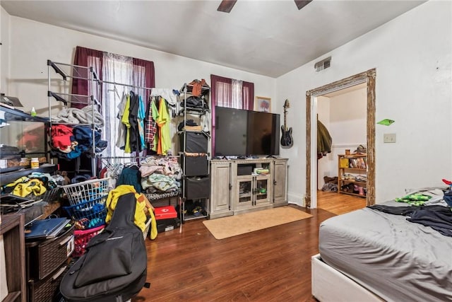 bedroom featuring hardwood / wood-style flooring and ceiling fan