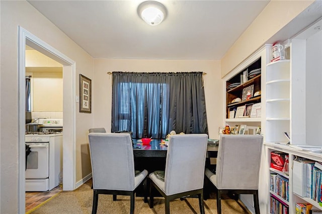 view of carpeted dining room