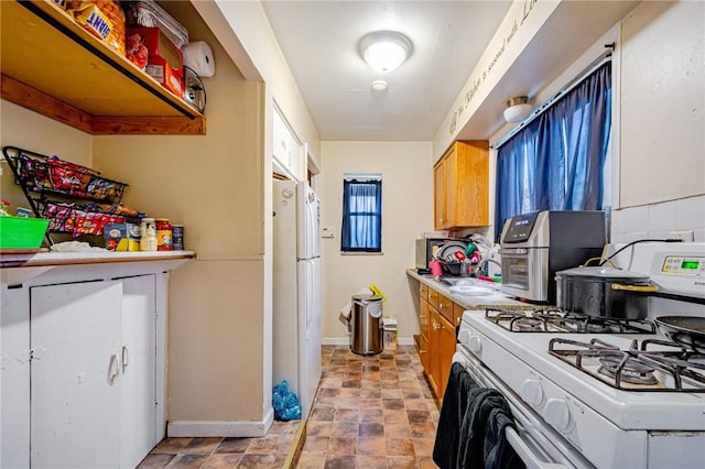 kitchen featuring white appliances