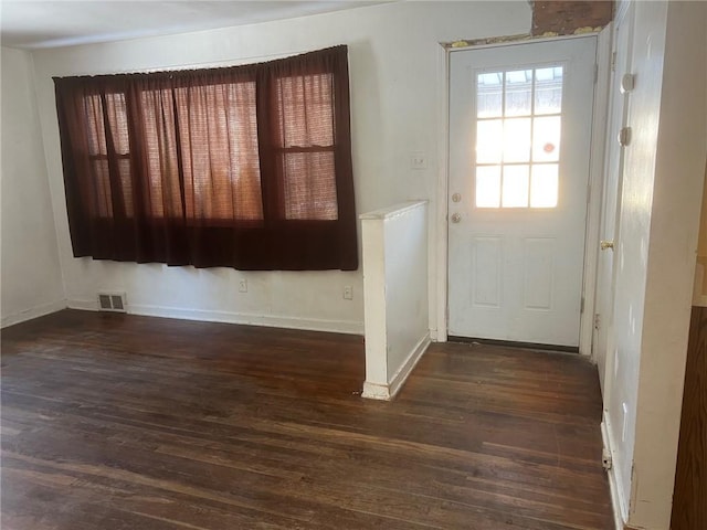 doorway featuring dark hardwood / wood-style flooring