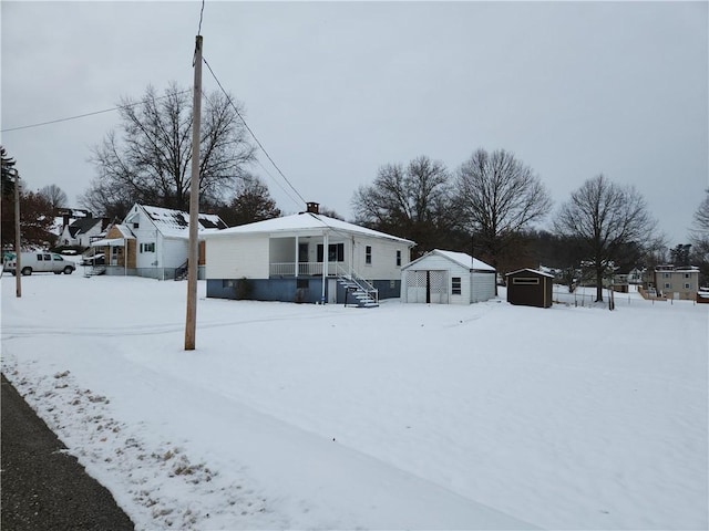 exterior space featuring a storage unit