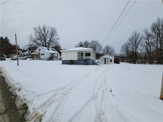 view of yard covered in snow