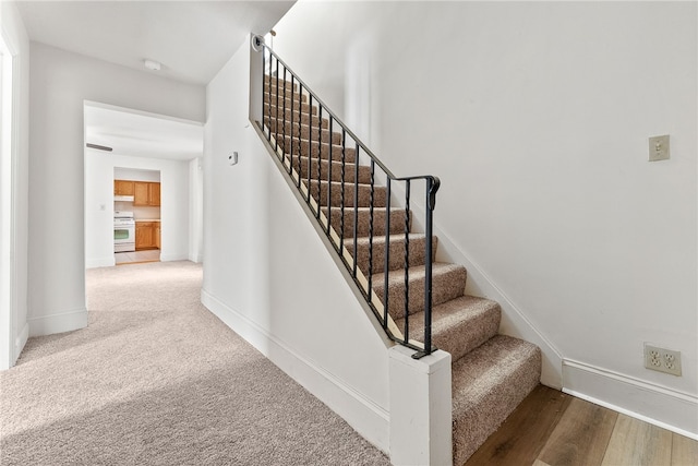 stairs with carpet floors