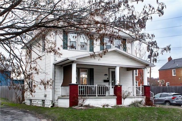 view of front of property featuring covered porch