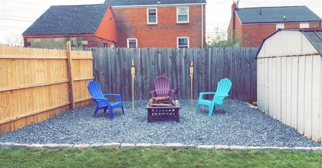 view of patio with a fire pit