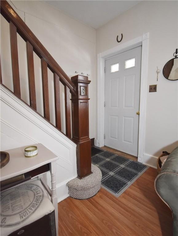 foyer entrance featuring wood-type flooring