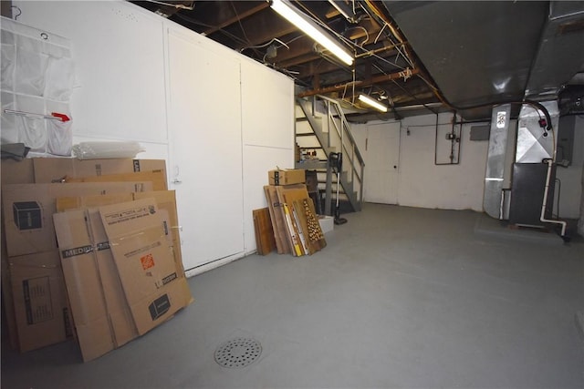 basement featuring heating unit