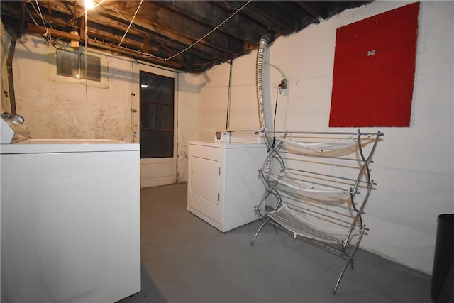 laundry room with washing machine and clothes dryer