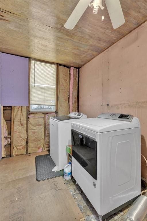 laundry area featuring ceiling fan, washing machine and dryer, and wooden ceiling