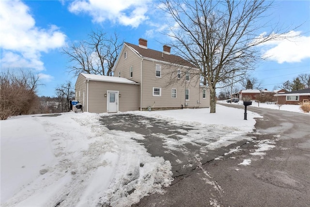 view of snow covered property