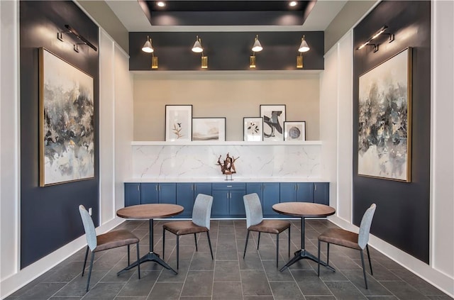 interior space featuring a tray ceiling