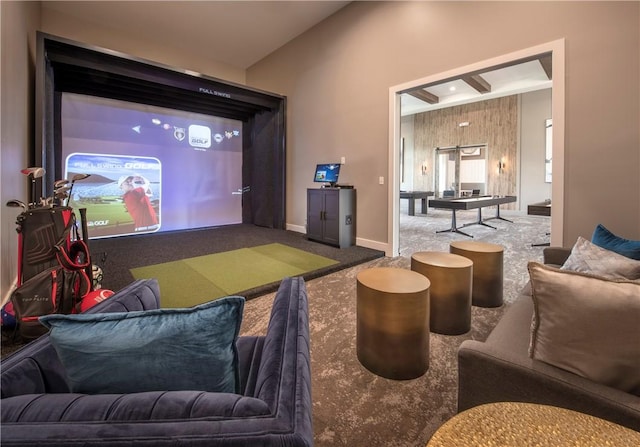 carpeted cinema featuring golf simulator and vaulted ceiling