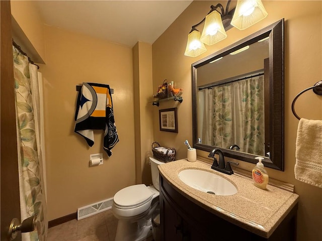 bathroom featuring tile patterned floors, vanity, toilet, and a shower with shower curtain