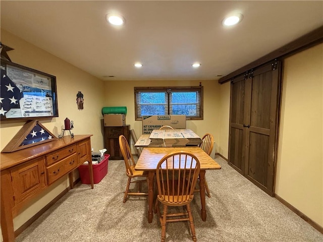 view of carpeted dining area