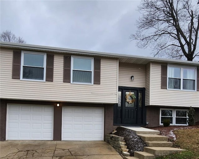 split foyer home featuring a garage