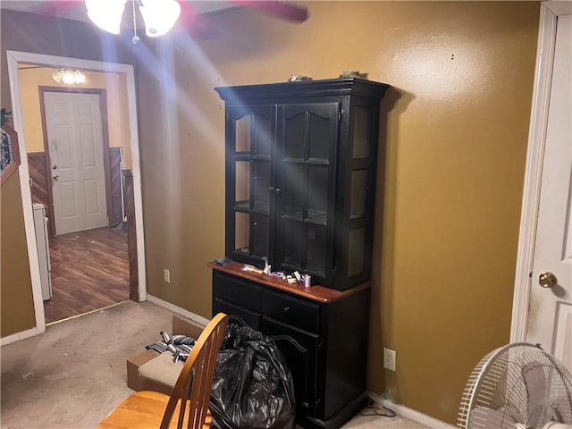 interior space featuring ceiling fan