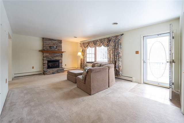 carpeted living room with baseboard heating and a stone fireplace