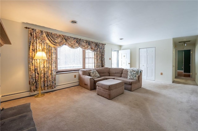 living room with light colored carpet and a baseboard radiator