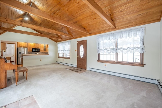 foyer entrance with baseboard heating, vaulted ceiling with beams, light colored carpet, and wood ceiling