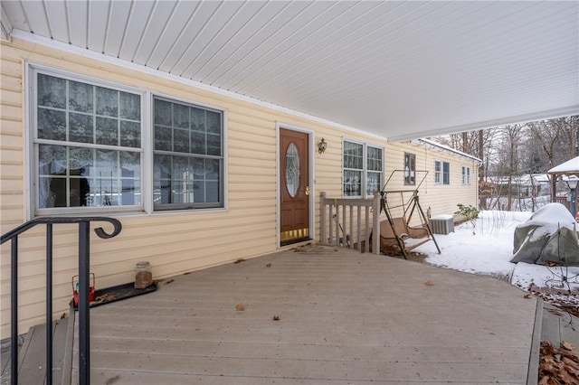 view of snow covered deck